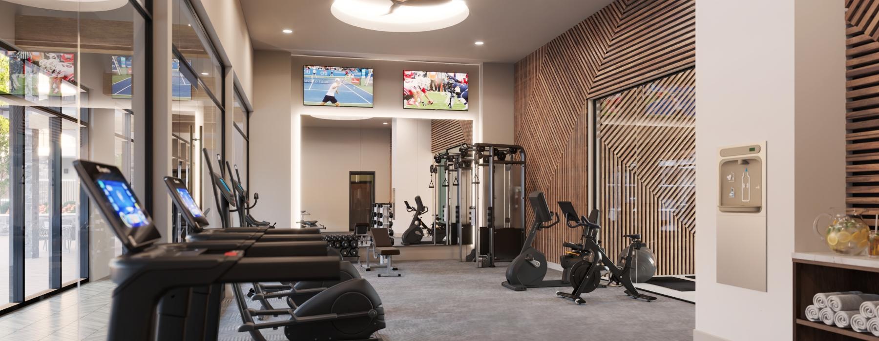 fitness center with ample lighting throughout