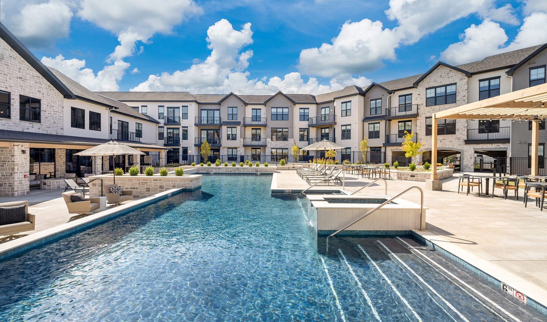pool with lounge chairs