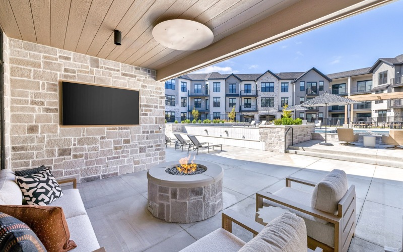 a fire pit with a media area and sounds